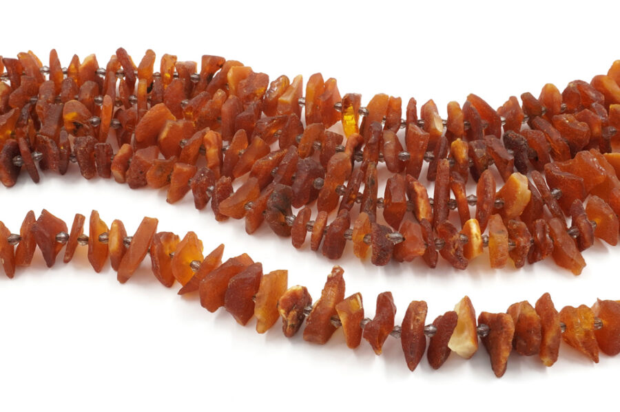 Ambra Baltica fili chips superficie grezza 18x6mm, 20x6mm