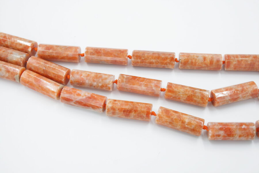 orange calcite fili cilindri sfaccettati 30x12mm