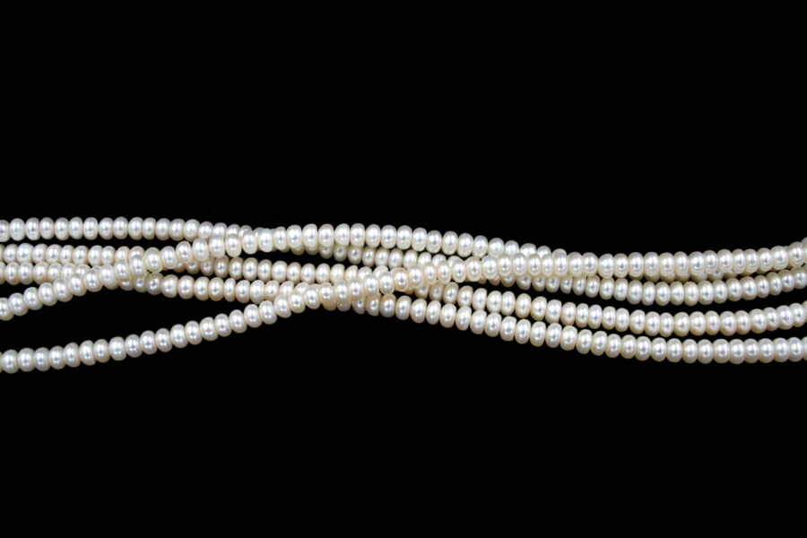 Perle d'acqua Dolce fili "button" 5-5½mm
