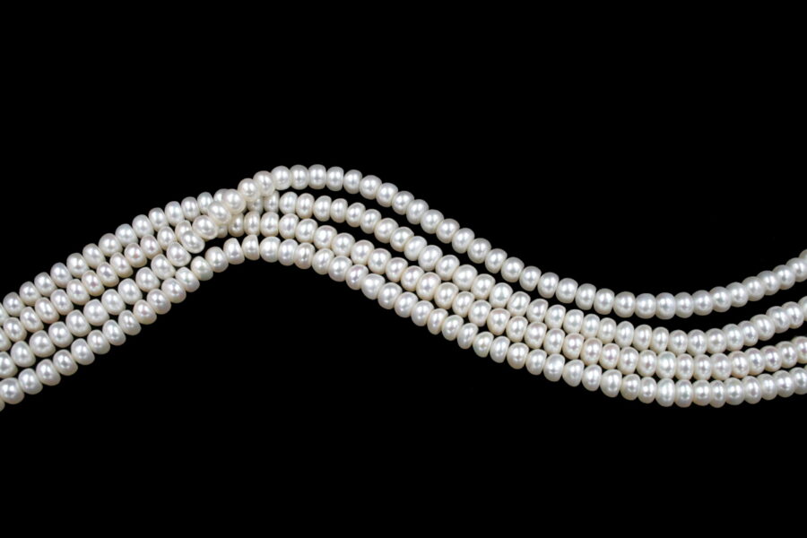 Perle d'acqua Dolce fili "bottone" 6-6½mm