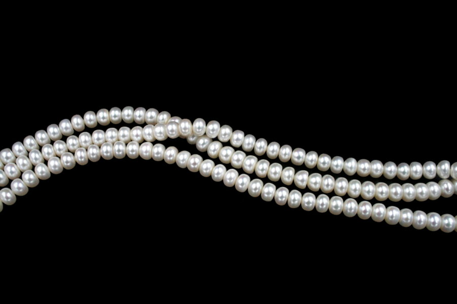 Perle d'acqua Dolce fili "button" 9-9½mm