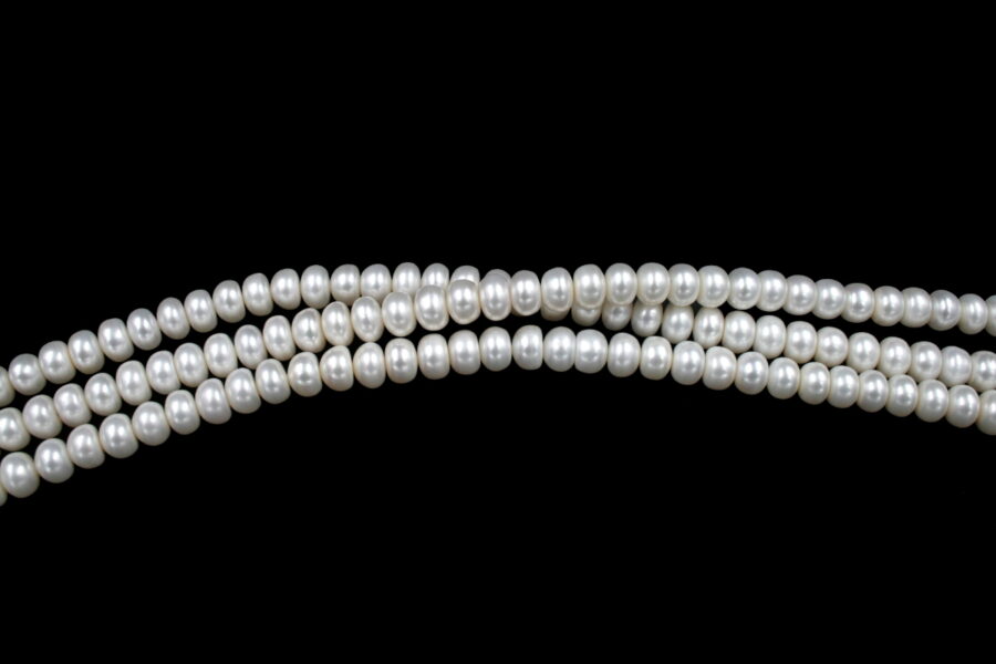 Perle d'acqua Dolce fili "button" 10-10½mm - Bianco e Color Naturale