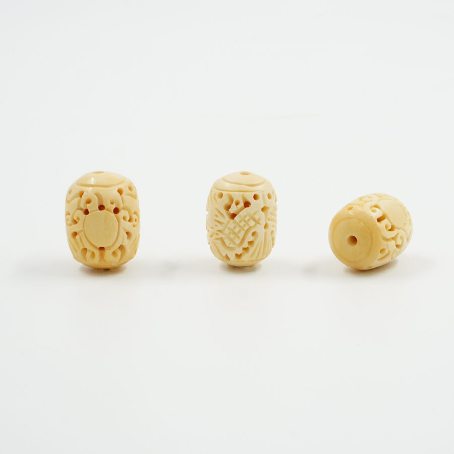 Tramezzi inciso in osso di bufalo forma barilotto 30x22mm – Foro Passante