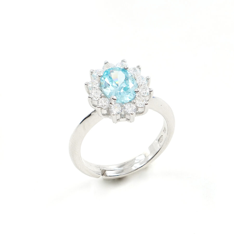 Anello in argento 925 con zircone ovale azzurro e giro di zirconi bianchi - Rodiato