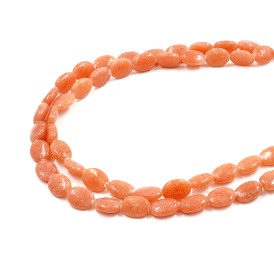 Calcite Salmone fili piatti ovali 10x14mm
