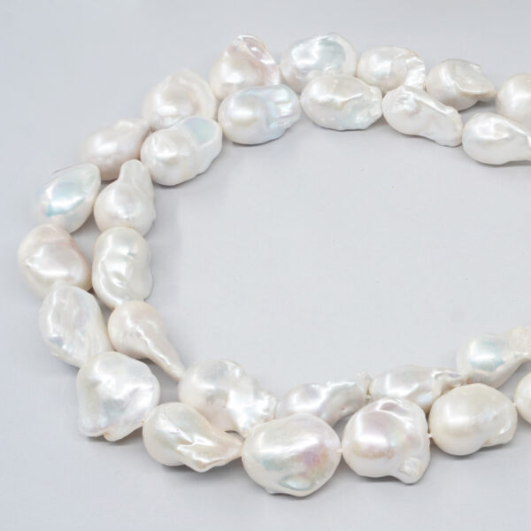 Perle d'Acqua Dolce fili barocchi con nucleo 12-15mm